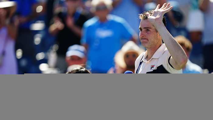 John Isner addresses the crowd after his final U.S. Open appearance.